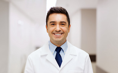 Image showing smiling doctor in white coat at hospital