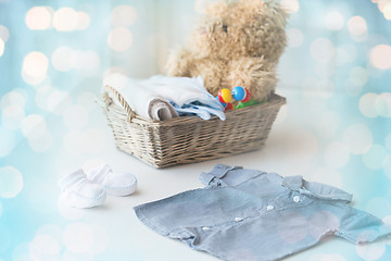 Image showing close up of baby clothes and toys for newborn