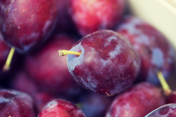 Image showing close up of satsuma plums in box at street market