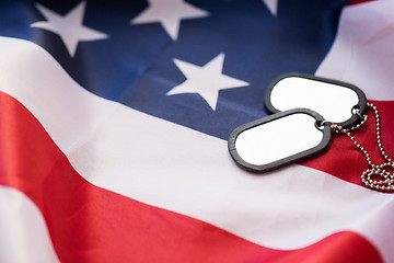 Image showing close up of american flag and military badges