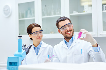 Image showing young scientists making test or research in lab