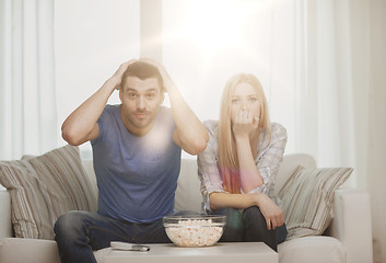 Image showing upset couple after sports team loss