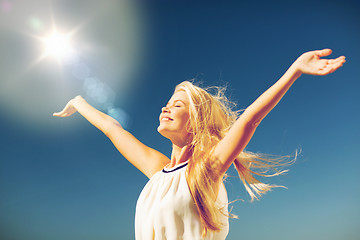 Image showing beautiful woman enjoying summer outdoors