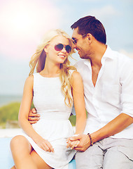 Image showing couple in shades at seaside