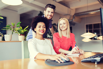 Image showing happy creative team in office