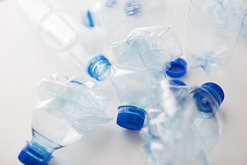 Image showing close up of empty used plastic bottles on table