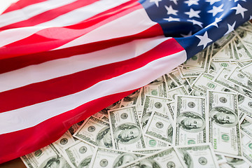 Image showing close up of american flag and dollar cash money
