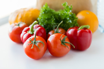 Image showing close up of fresh ripe vegetables on kitchen table