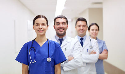 Image showing group of happy medics or doctors at hospital