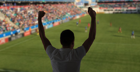 Image showing man watching soccer of football game on stadium