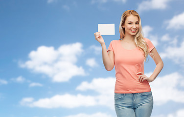 Image showing happy woman or teen girl with blank white paper