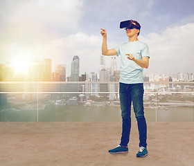 Image showing happy man in virtual reality headset or 3d glasses