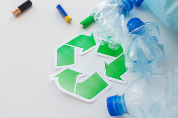 Image showing close up of used bottles and batteries recycling