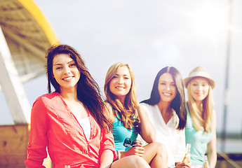 Image showing girls with drinks on the beach