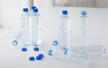 Image showing close up of bottles with drinking water on table