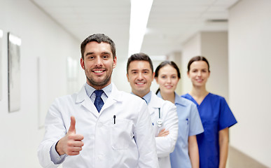 Image showing medics or doctors at hospital showing thumbs up