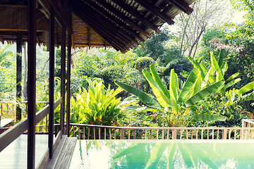 Image showing swimming pool and bungalow at hotel resort