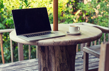 Image showing close up of laptop computer on table at hotel