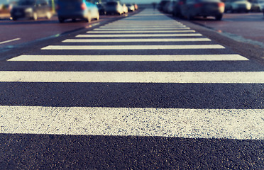 Image showing close up of pedestrian crosswalk on city parking