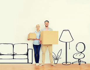 Image showing couple with cardboard boxes moving to new home