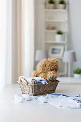 Image showing close up of baby clothes and toys for newborn