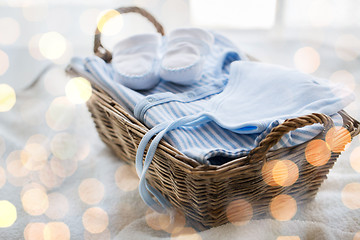 Image showing close up of baby clothes for newborn boy in basket