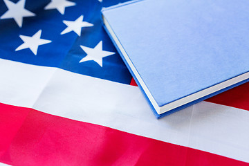 Image showing close up of american flag and book