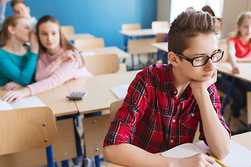 Image showing students gossiping behind classmate back at school