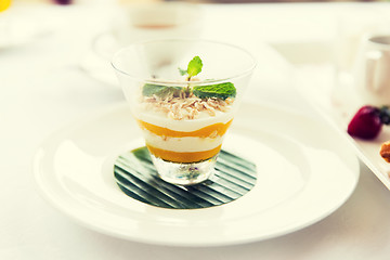 Image showing close up of dessert in glass at restaurant