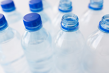 Image showing close up of bottles with drinking water on table