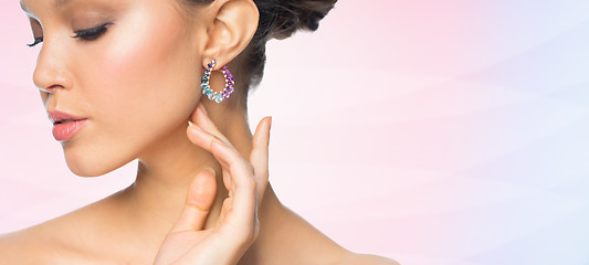 Image showing close up of beautiful woman face with earring