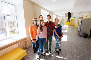 Image showing group of students taking selfie with smartphone