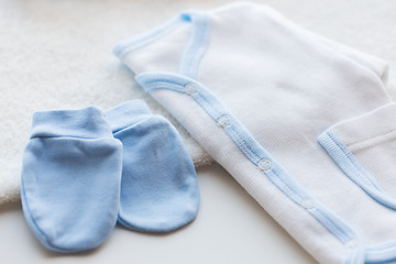 Image showing close up of baby boys clothes for newborn on table