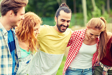 Image showing group of smiling friends outdoors