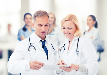 Image showing two doctors looking at tablet pc