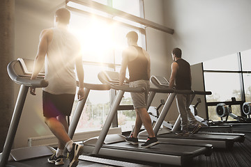 Image showing men exercising on treadmill in gym