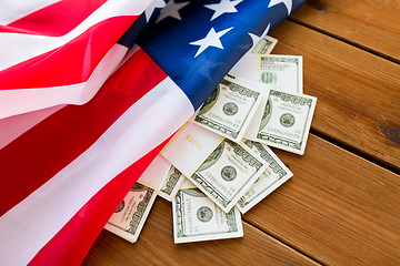 Image showing close up of american flag and dollar cash money