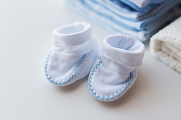 Image showing close up of baby boys clothes for newborn on table