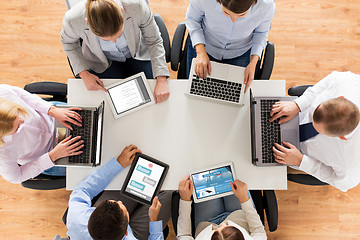 Image showing business team with laptop and tablet pc computers