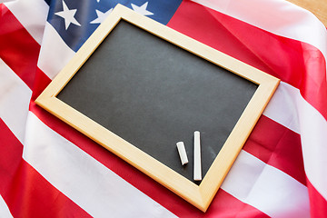 Image showing close up of school blackboard on american flag