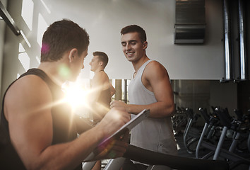 Image showing men exercising on treadmill in gym