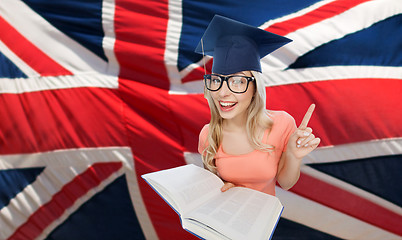 Image showing student woman in mortarboard over english flag