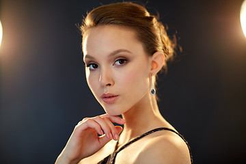 Image showing beautiful young asian woman with diamond earring