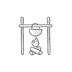 Image showing Cooking in cauldron on campfire sketch icon.