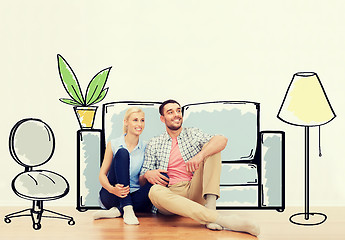 Image showing happy couple of man and woman moving to new home