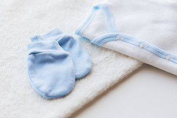 Image showing close up of baby boys clothes for newborn on table