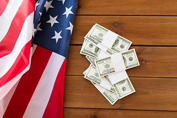 Image showing close up of american flag and dollar cash money