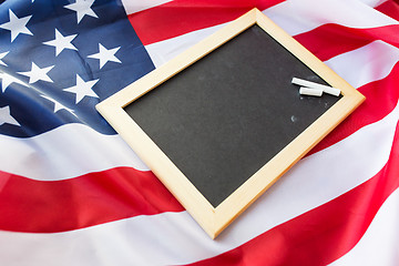 Image showing close up of school blackboard on american flag