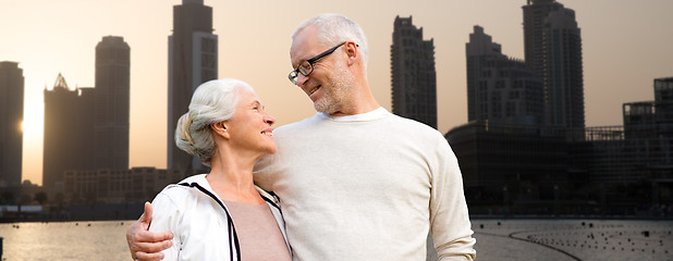 Image showing senior couple over dubai city street background