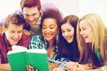 Image showing students reading book at school